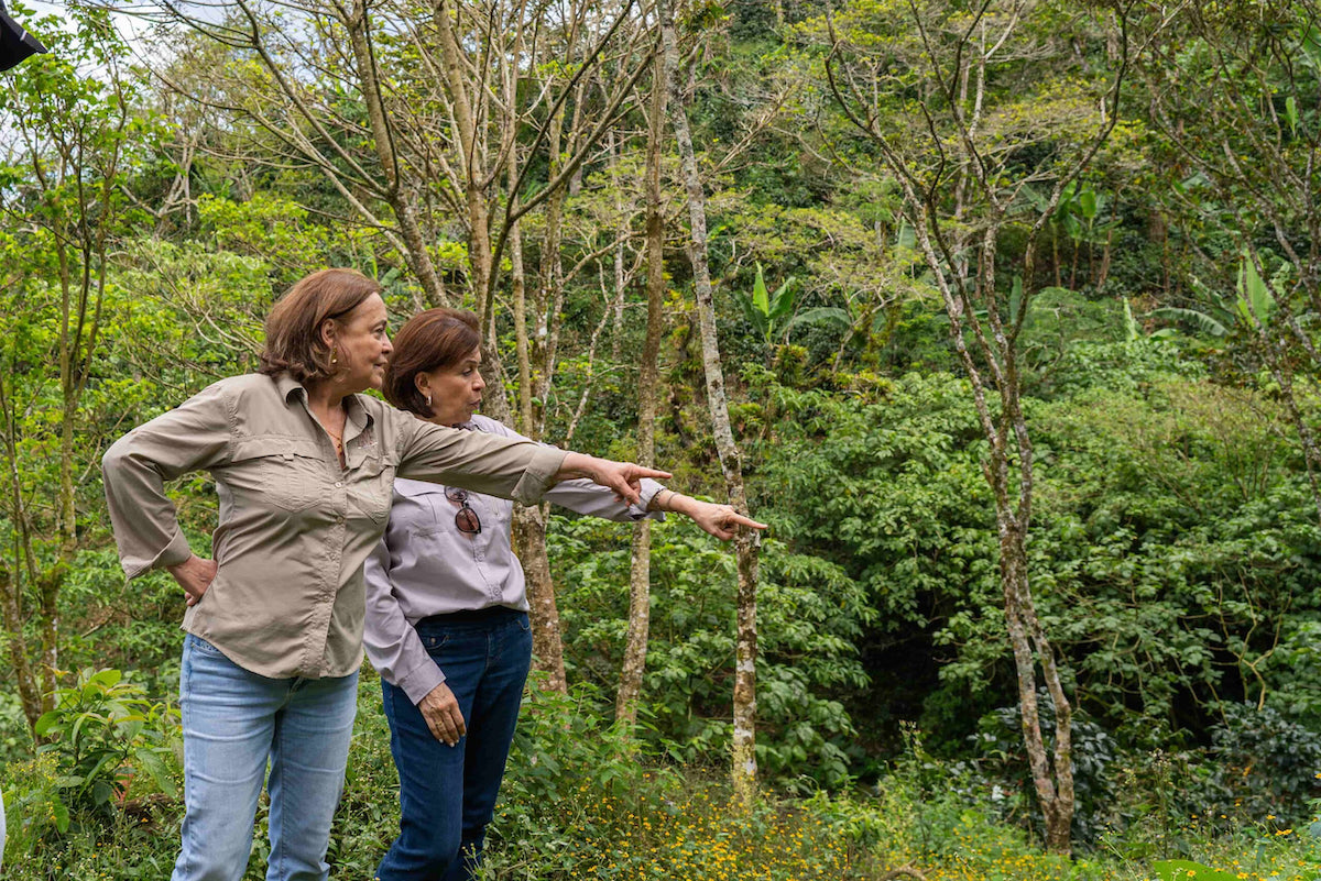 Martha Albir with her sister on their coffee farm