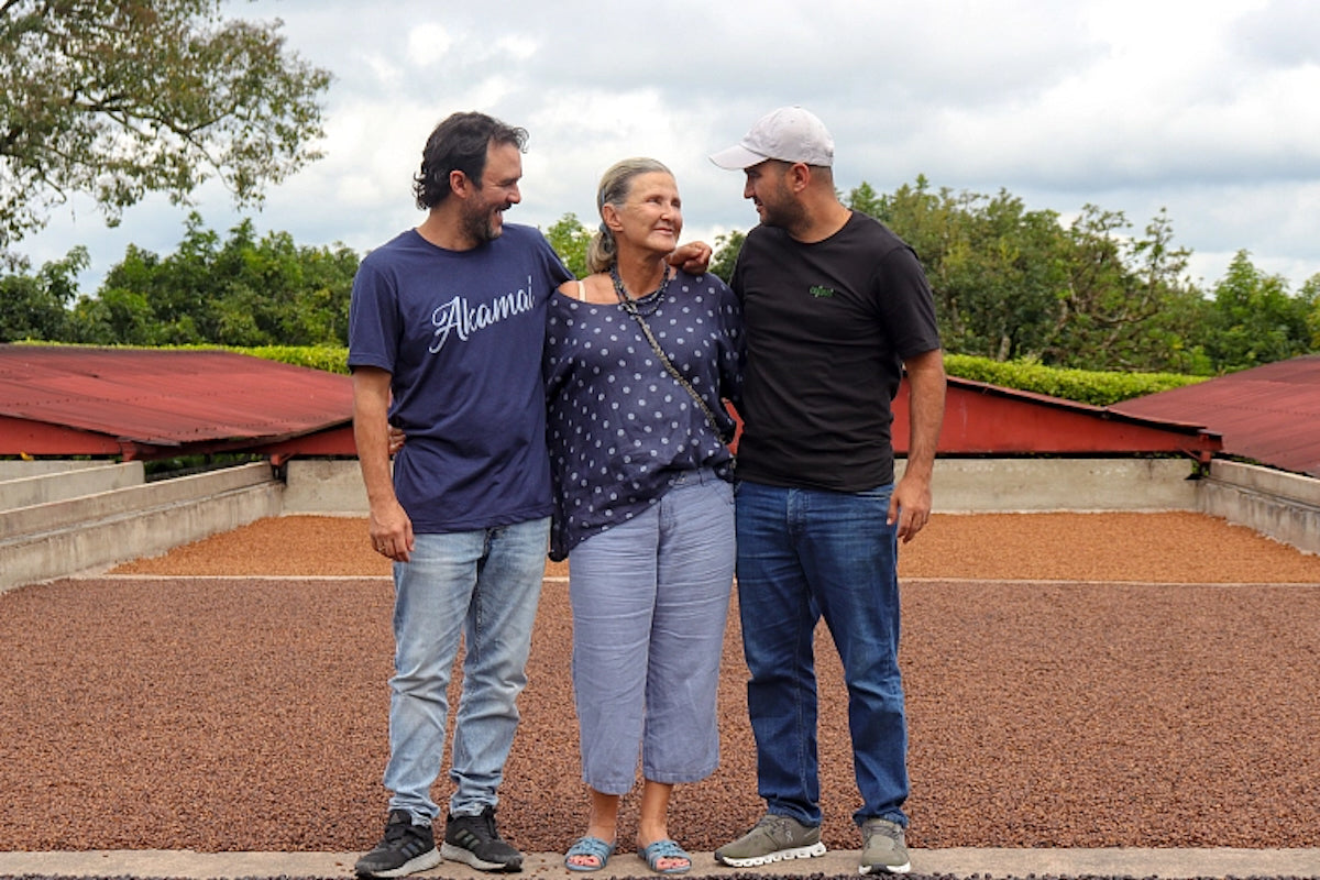 Luz Helena with her sons on their coffee farm