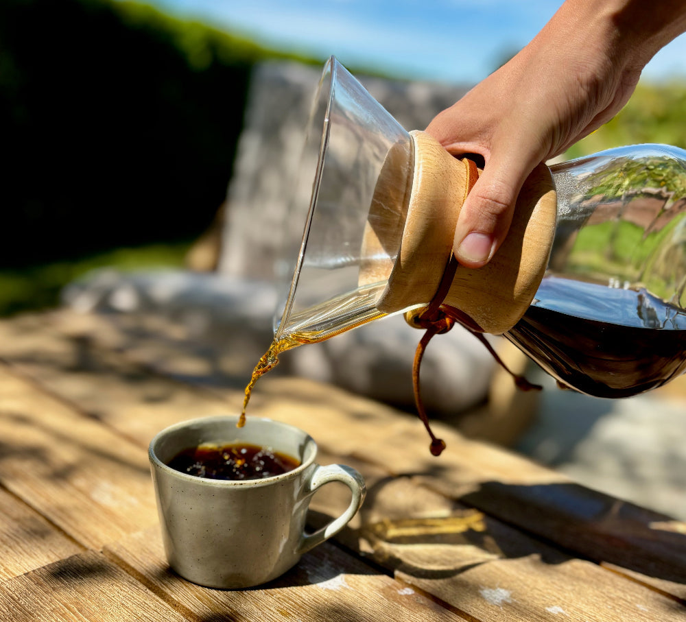 Pouring filter coffee from a Chemex